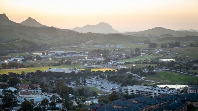 Distance photo of campus at sunset